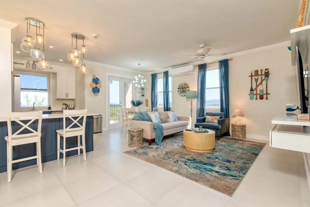Ocean Spring Apartments, a past PDCL project: an open-plan living room and kitchen